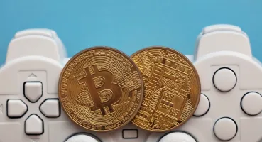 Crypto,Gaming,Concept.,Video,Game,Controller,With,A,Bitcoin,Cryptocurrency